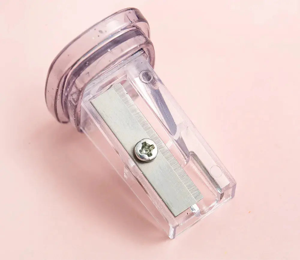 Kawaii cat paw pencil sharpener, clear pink plastic with metal blade
