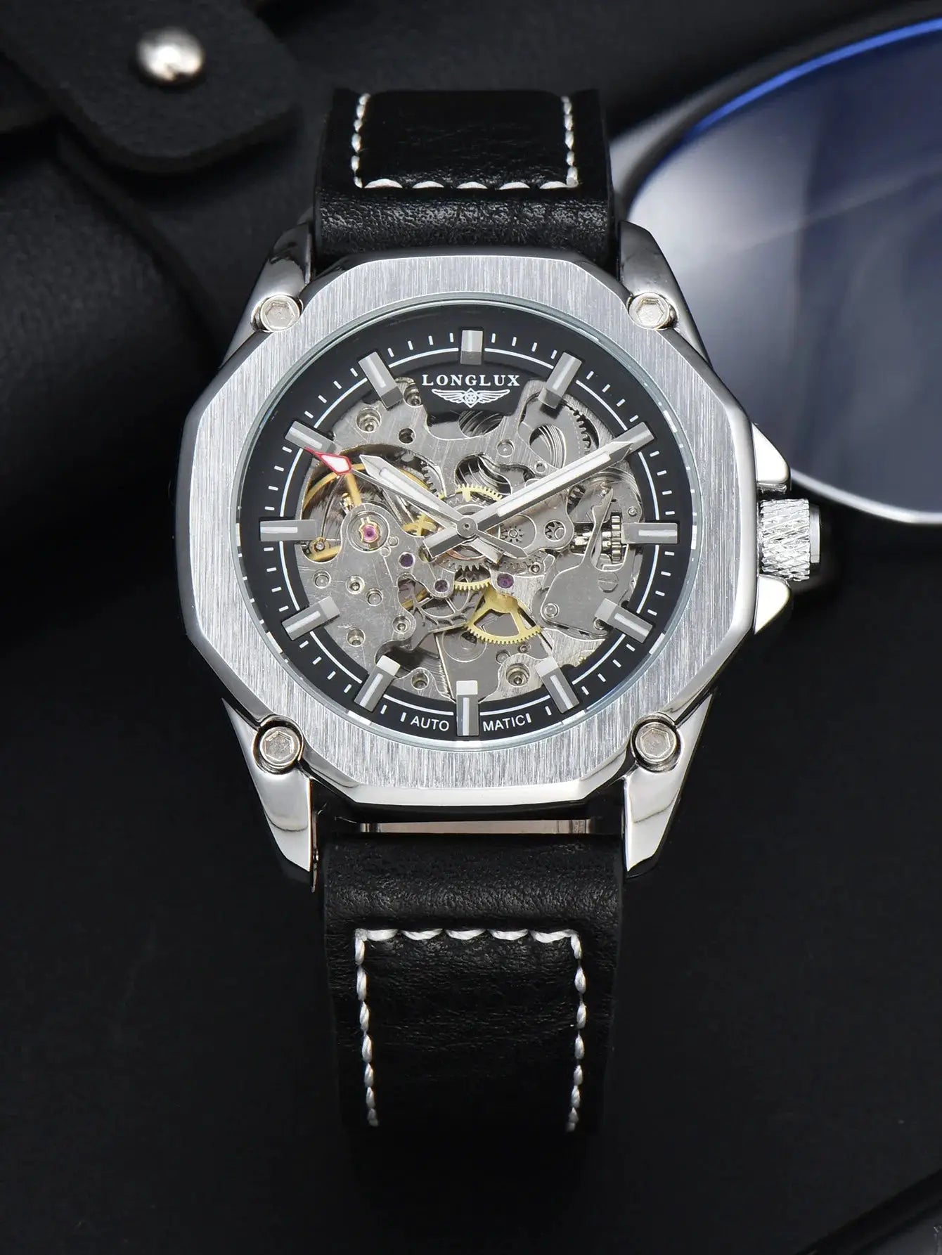 LongLux skeleton automatic men's wristwatch with steel brushed case and black leather strap with white stitching
