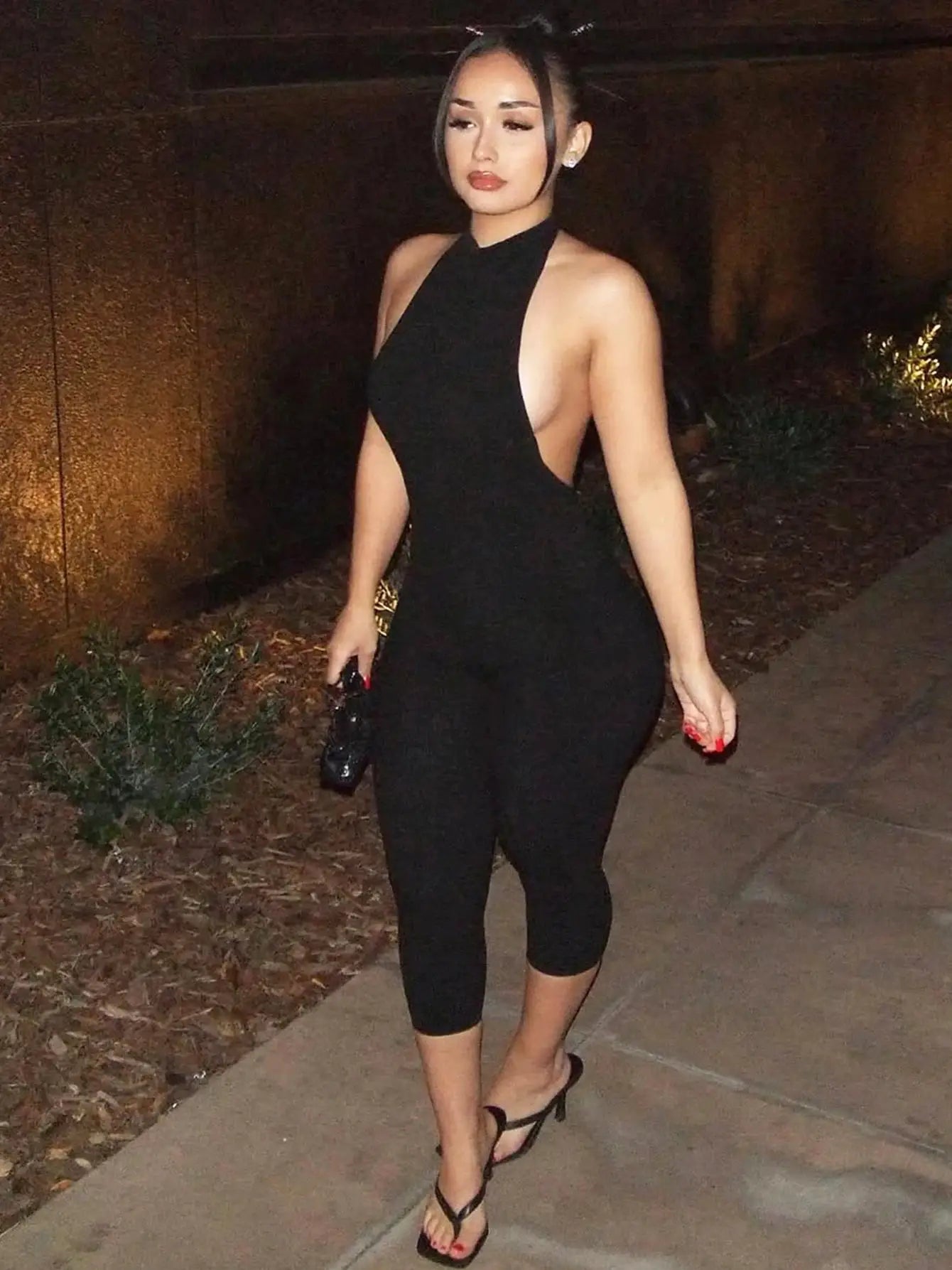 Hugcitar ribbed halter backless black bodycon jumpsuit, mid-calf length, sleek evening wear
