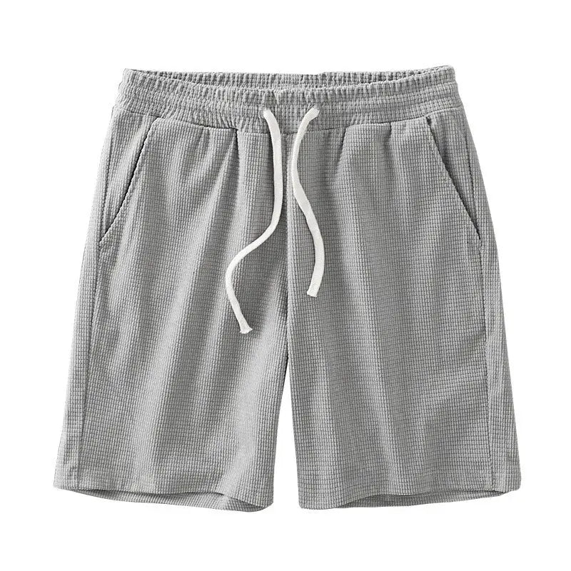 Men's grey waffle-textured shorts with drawstring, mid-rise, knee-length casual shorts