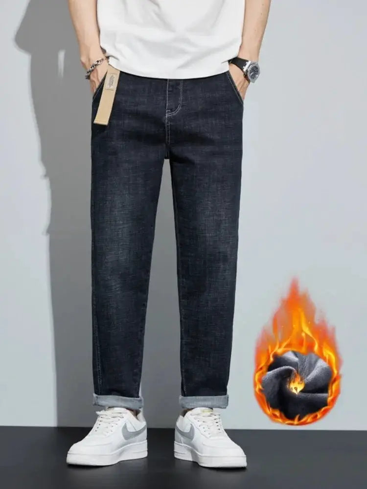 Men's dark blue fleece-lined jeans by Simples Market, loose straight fit with cuffed hems.