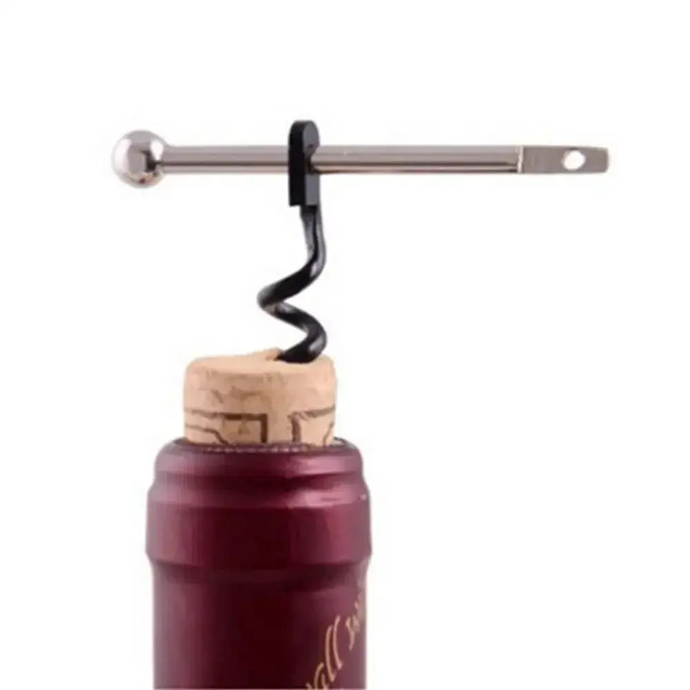 Mini corkscrew bottle opener keyring tool in silver with black spiral corkscrew inserted into cork on a red wine bottle