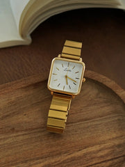 Gold square-dial women's wristwatch with stainless steel strap by Simples Market