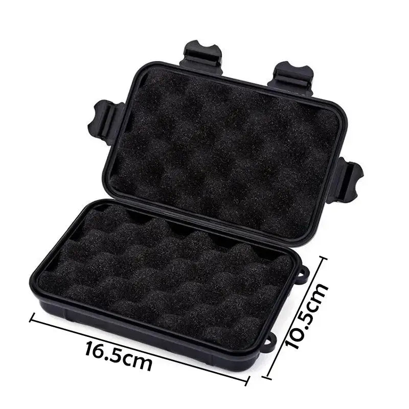 Survival storage box, outdoor waterproof black plastic case with foam lining, 16.5×10.5 cm.