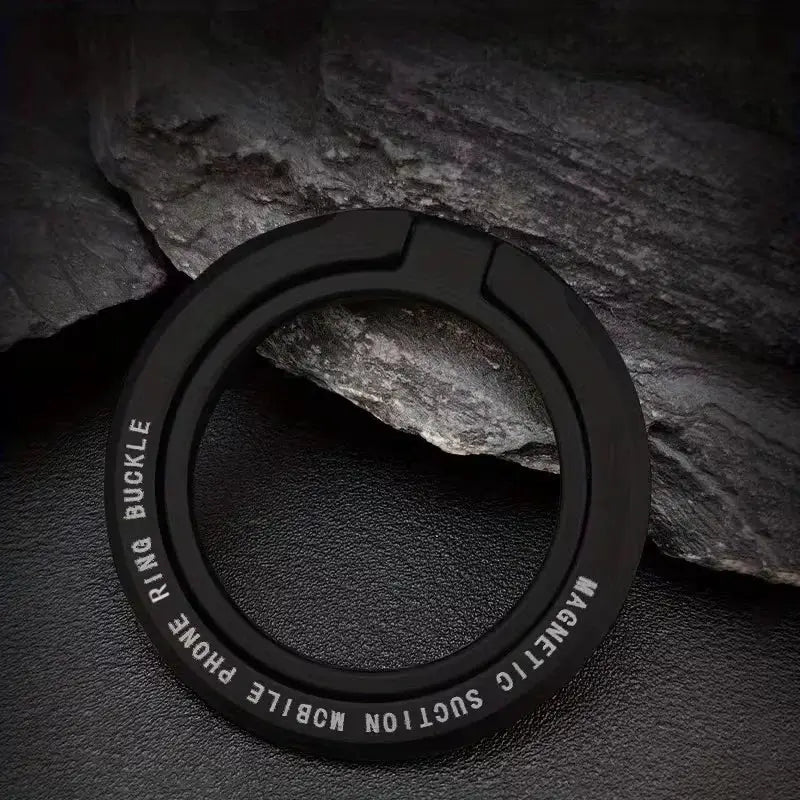 Magnetic phone ring holder, black circular grip with kickstand.