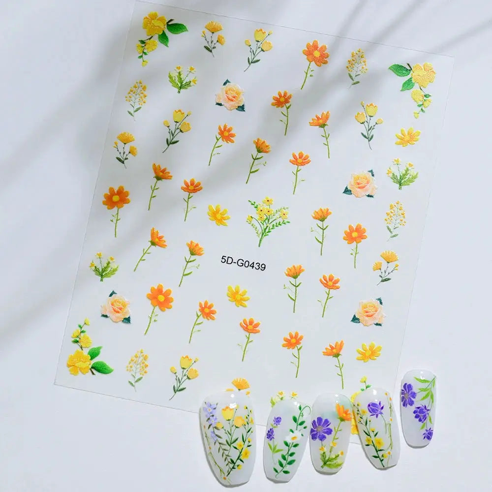 Nail decal sheet by Simples Market; 5D floral stickers in yellow and orange with rose motifs, shown on 5 manicure nails