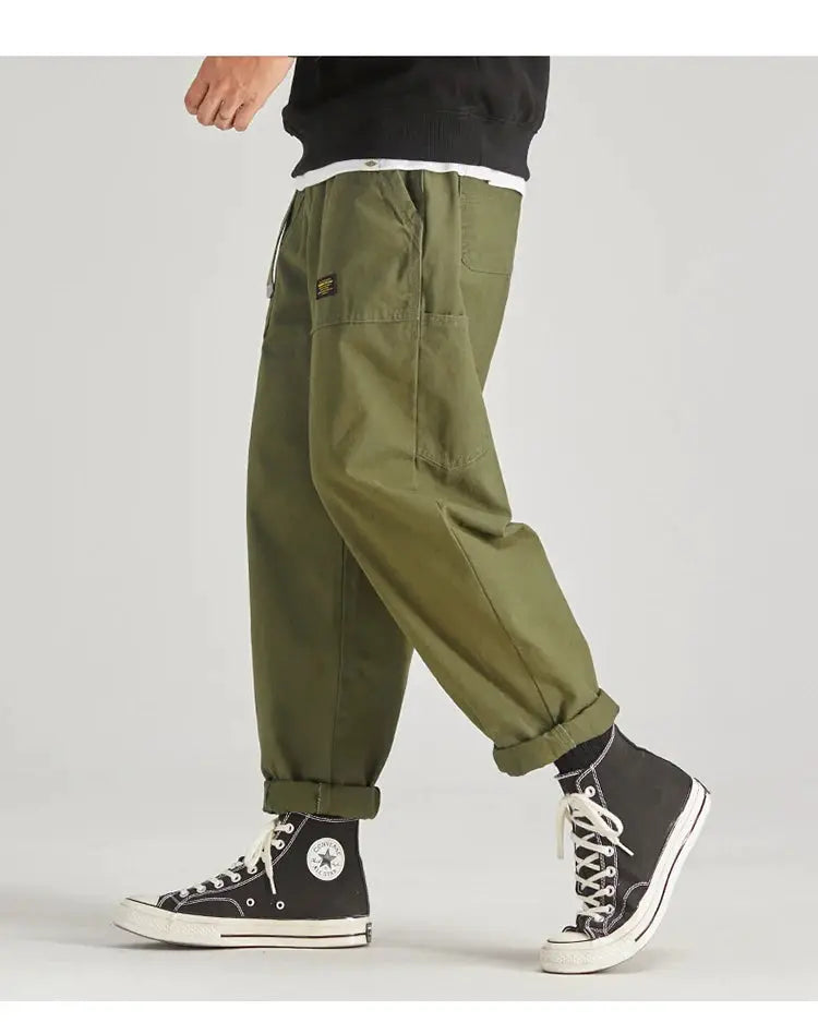HIQOR men's cargo pants olive green with multiple pockets, baggy jogger style, plus size.