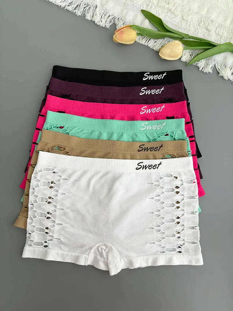 Seamless sports underpants set in assorted colors with side mesh hollow-out panels; white pair features lace sides.