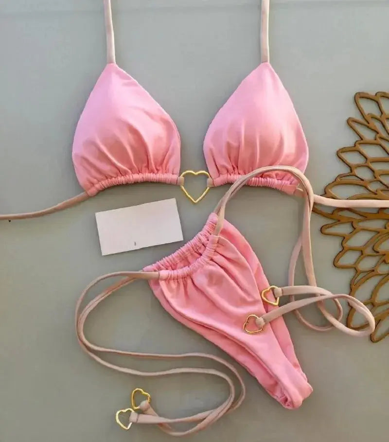 RUOTONSEPT pink solid halter bikini set with triangle top and thong bottoms, gold heart accents