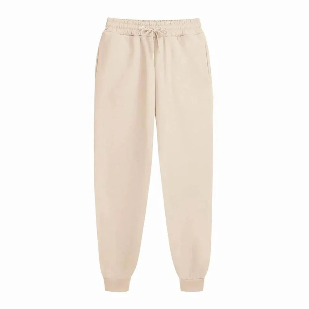 Men's fleece jogger sweatpants by Simples Market in beige solid color with drawstring waist and cuffed ankles