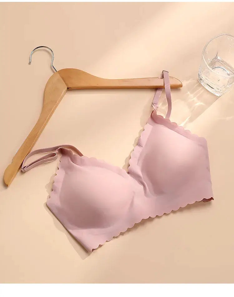 Simples Market pink wireless padded bra with scalloped wavy edge on hanger