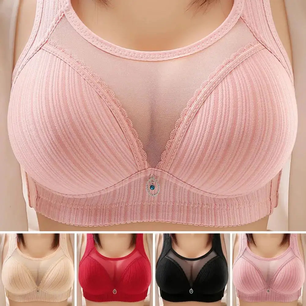 Women's wireless push-up bra with wide straps and pink ribbed fabric; four color options (beige, red, black, pink)