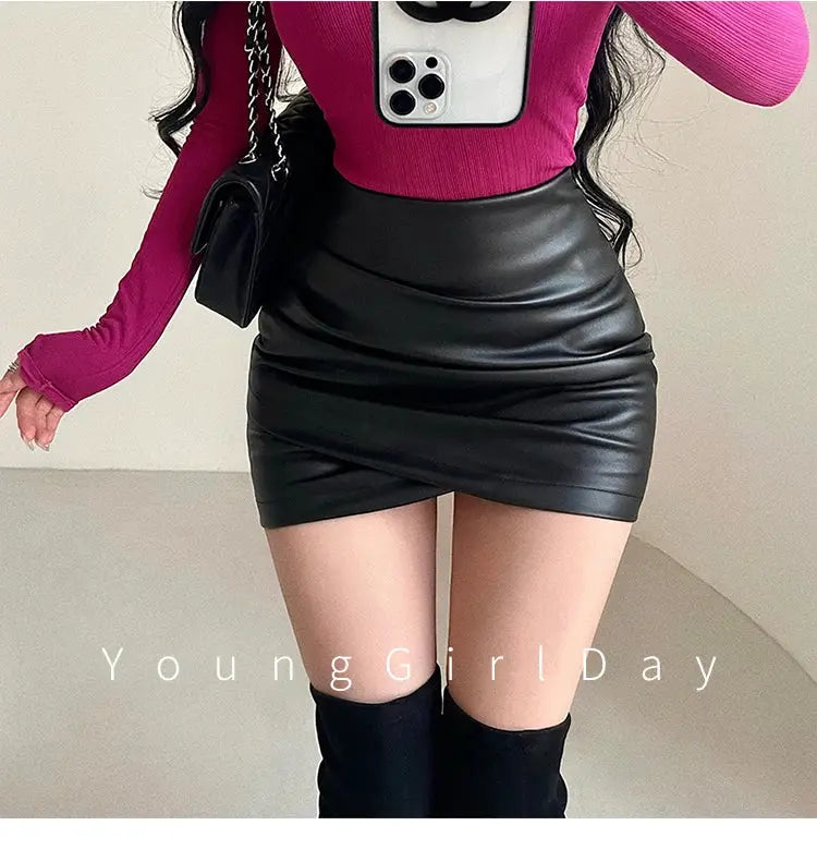 Black PU leather mini wrap skirt with high-waist and slim A-line silhouette