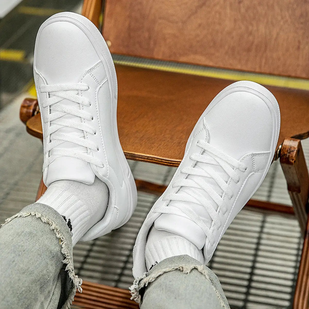 White PU leather sneakers, casual vulcanized-style footwear, two shown.