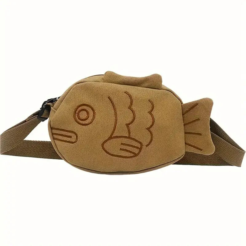 Fish-shaped canvas crossbody bag with brown embroidery, zipper closure, adjustable strap.