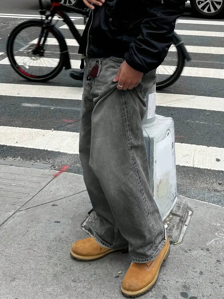 Men's gray washed denim jeans with loose fit and front pockets