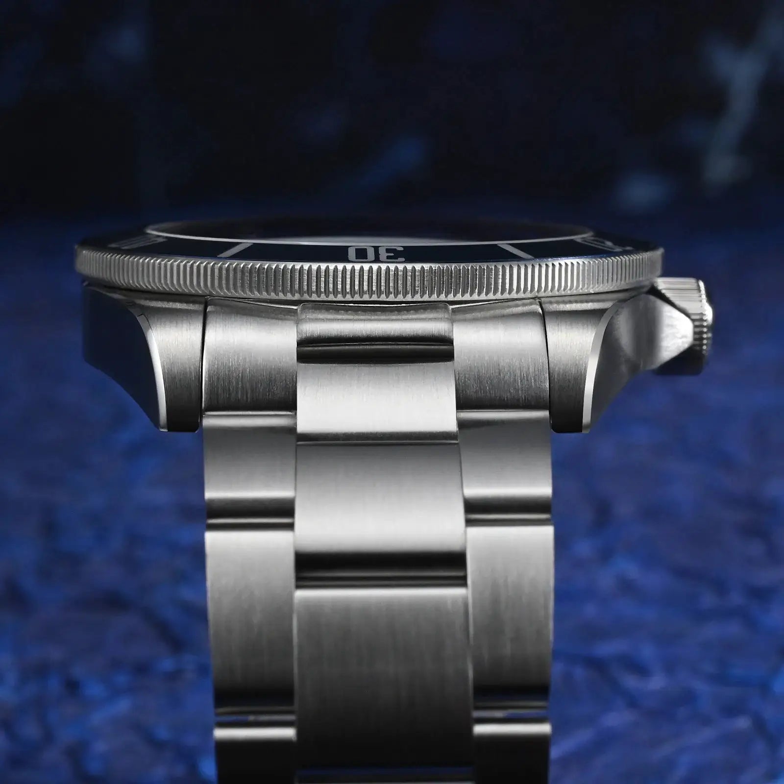 Watchdives WD1969 Pro 38mm quartz dive watch with blue bezel and stainless bracelet.
