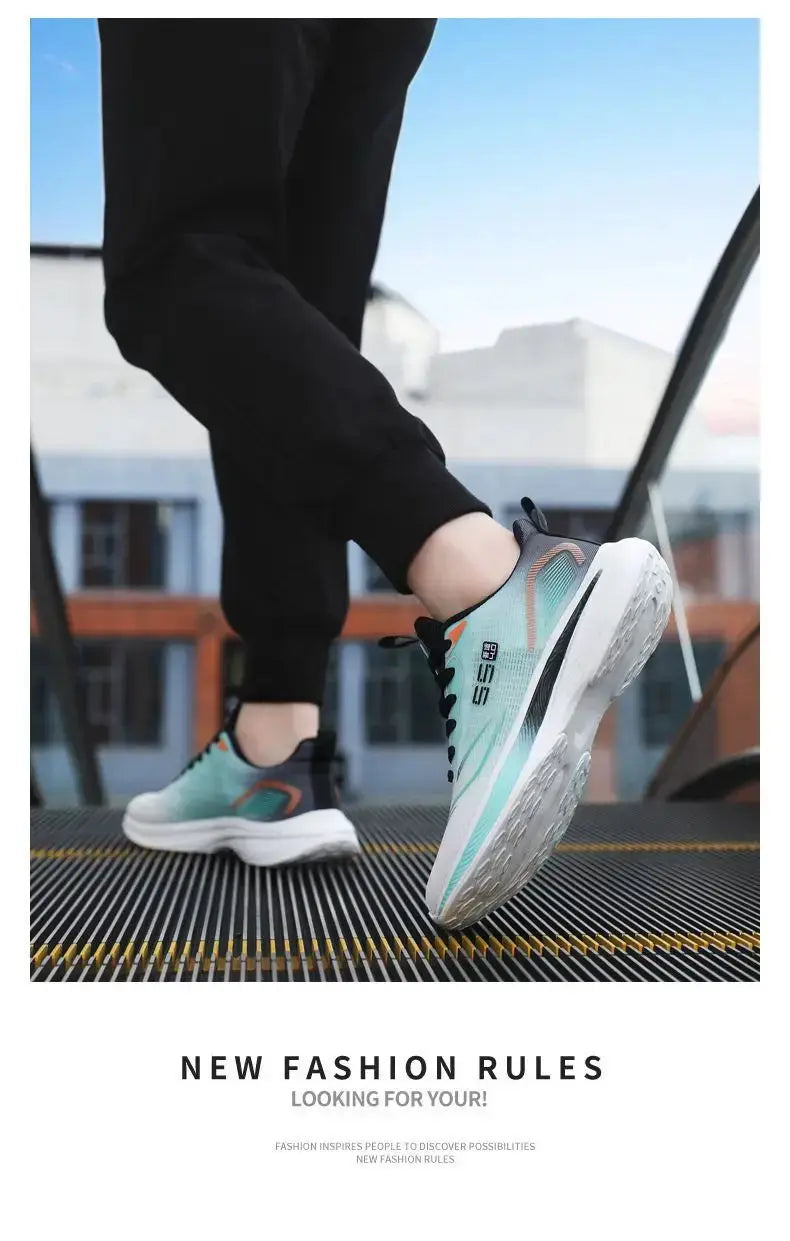Men's turquoise running shoes with white chunky sole, black laces and orange accents.