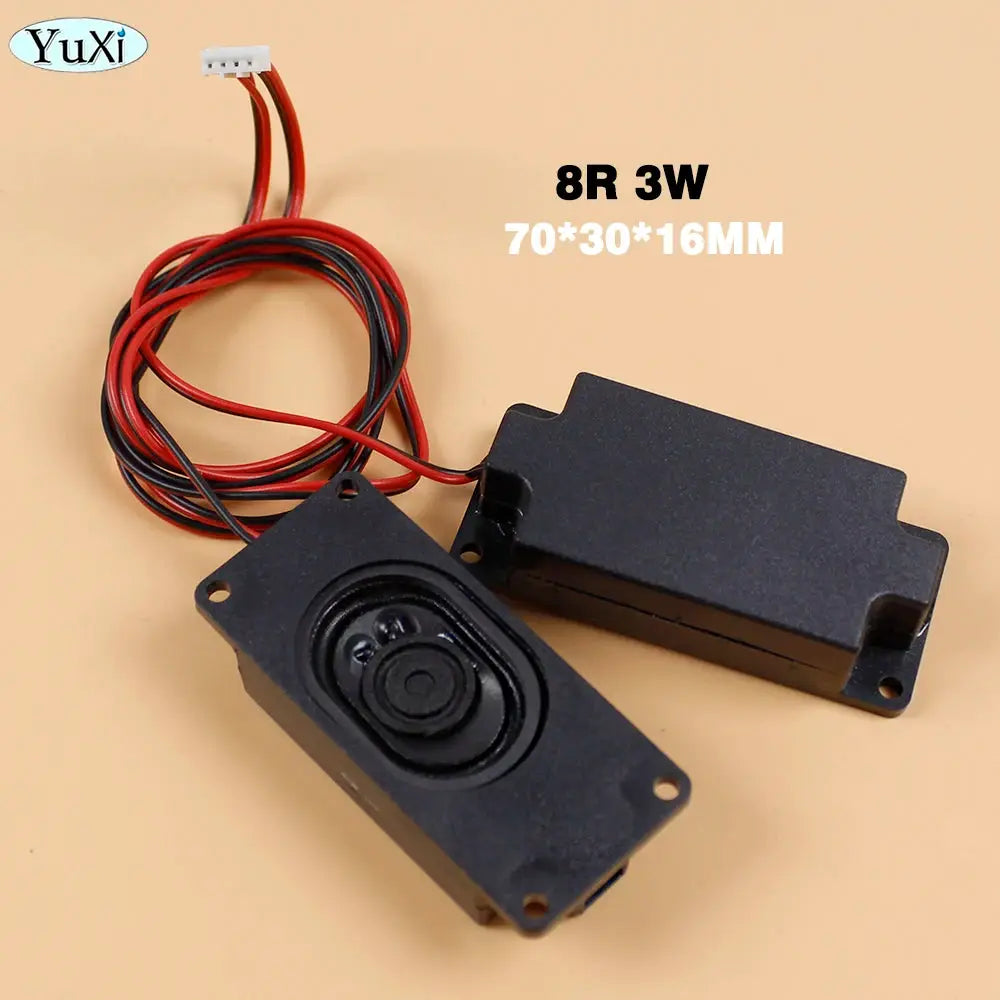 Simples Market pair of rectangular black PC speakers with red/black power wires and white connector, YuXi logo visible