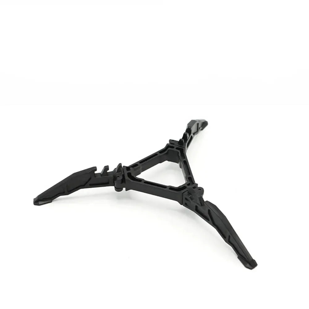 Gas can stabilizer tripod, foldable black plastic stand with three legs for outdoor camping.