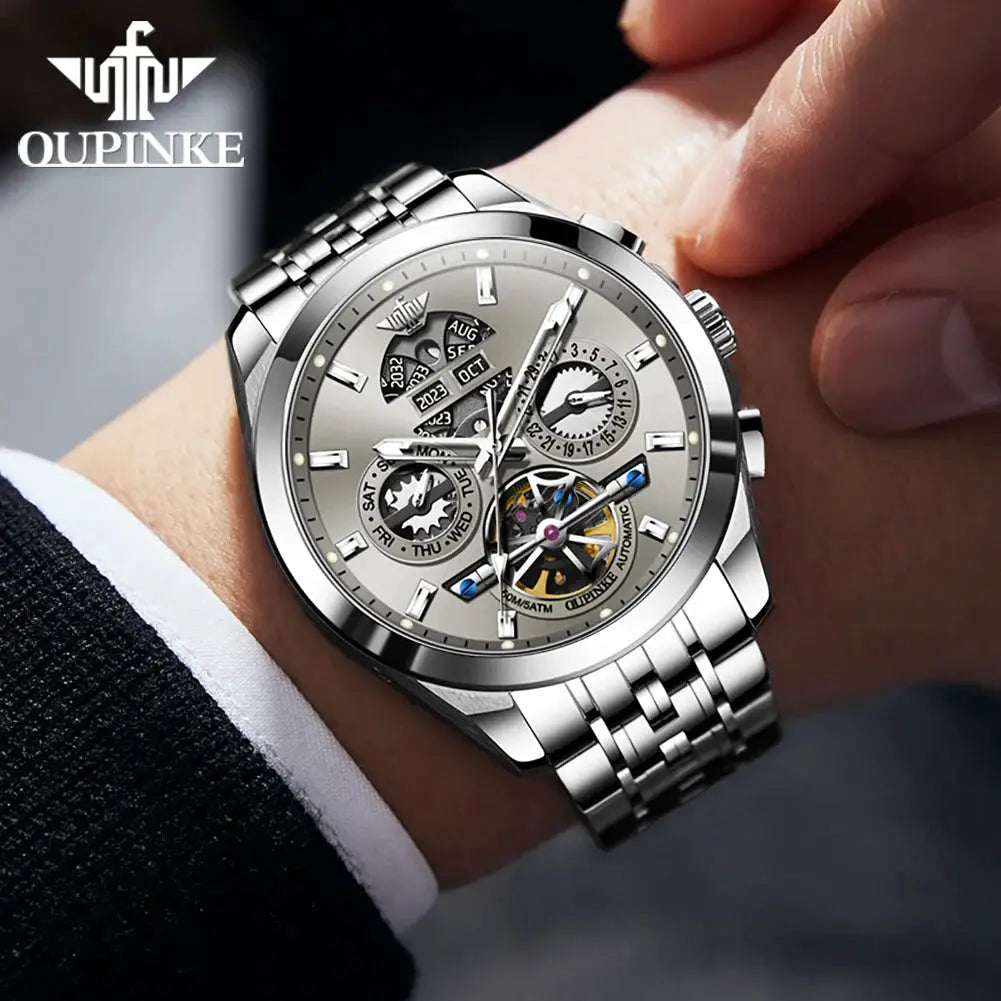 OUPINKE men's skeleton automatic watch with a silver stainless steel bracelet