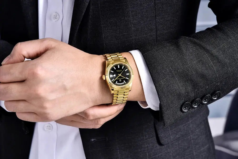 PAGANI DESIGN men's gold-tone stainless steel watch with black dial.