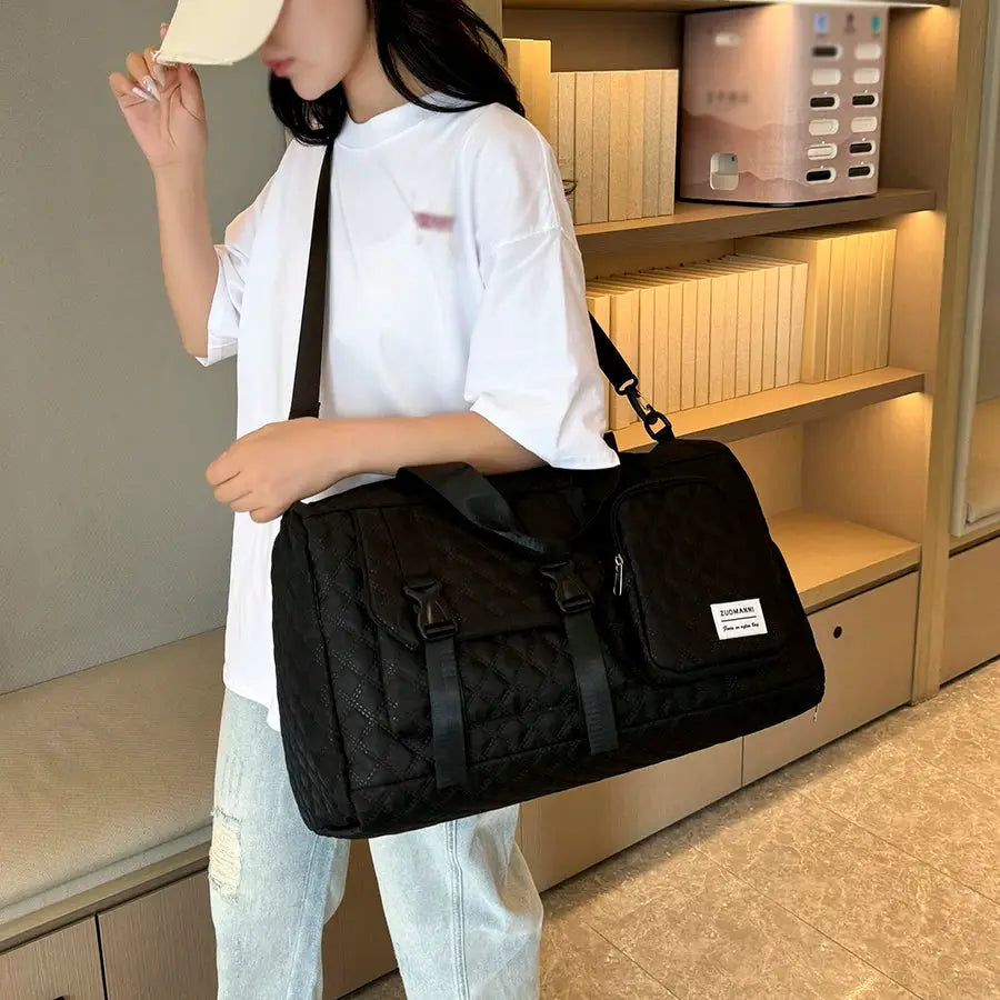 Durable Nylon Travel Duffle Bag by Simples Market, black quilted with front zip pocket and shoulder strap