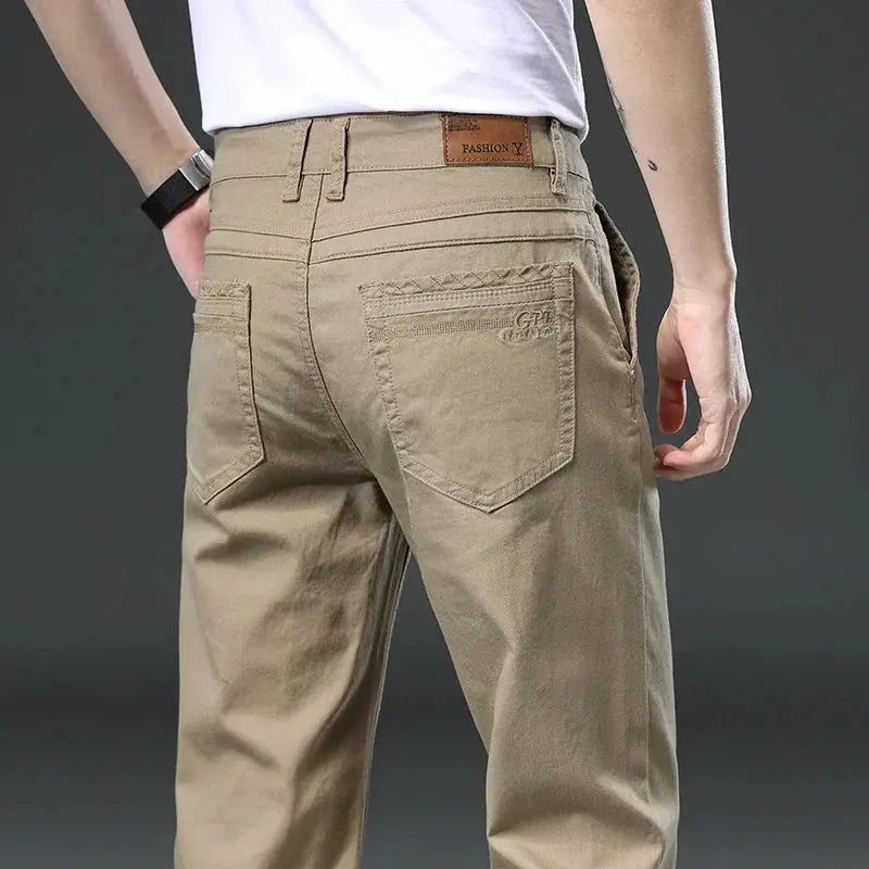 Khaki men's straight-fit cotton pants for business casual wear with back pockets and belt loops.