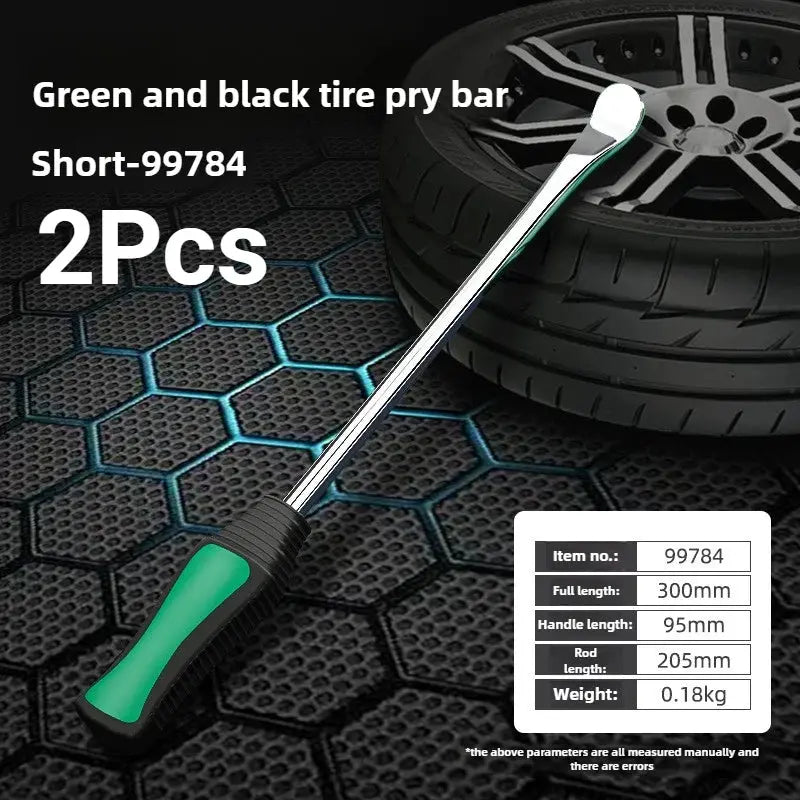 Automobile tire lever with green and black grip and chrome shaft beside a car tire.