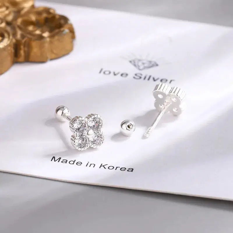 Sterling silver four-round zircon cluster stud earrings by Simples Market for women