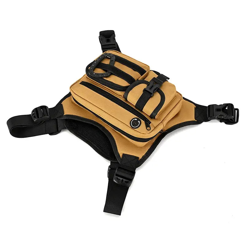 Outdoor tactical chest bag in tan with black straps and multiple zip pockets