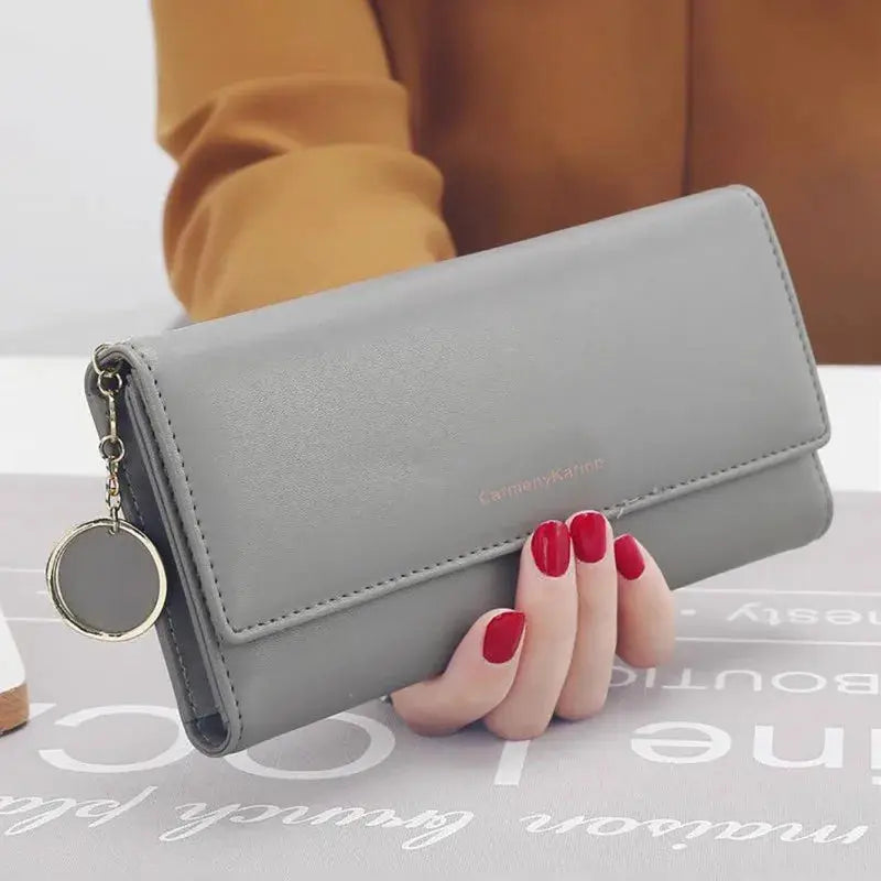 Simples Market long PU leather wallet clutch in grey with zip-around and circular charm