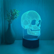 Skull USB night light with blue LED glow, 3D wireframe design