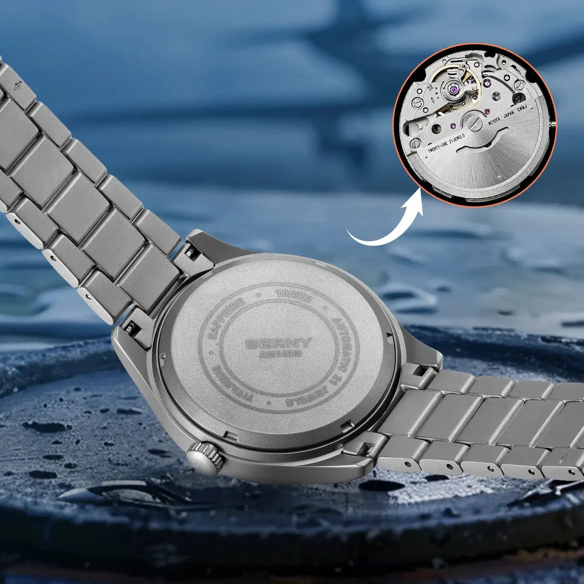 BERNY titanium aviation men's watch with silver metal bracelet; inset shows mechanical movement.
