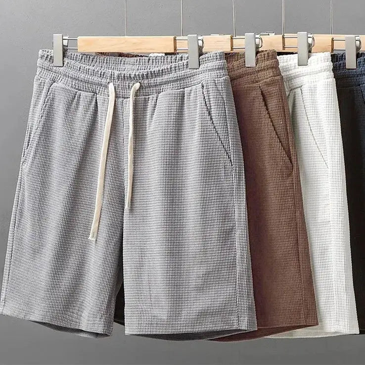 Men's waffle-texture shorts with drawstrings; mid waist, knee-length, loose fit; five-pair gray, brown, white, navy set.