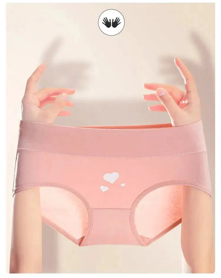 Pink high-waist breathable cotton panties with white heart print.