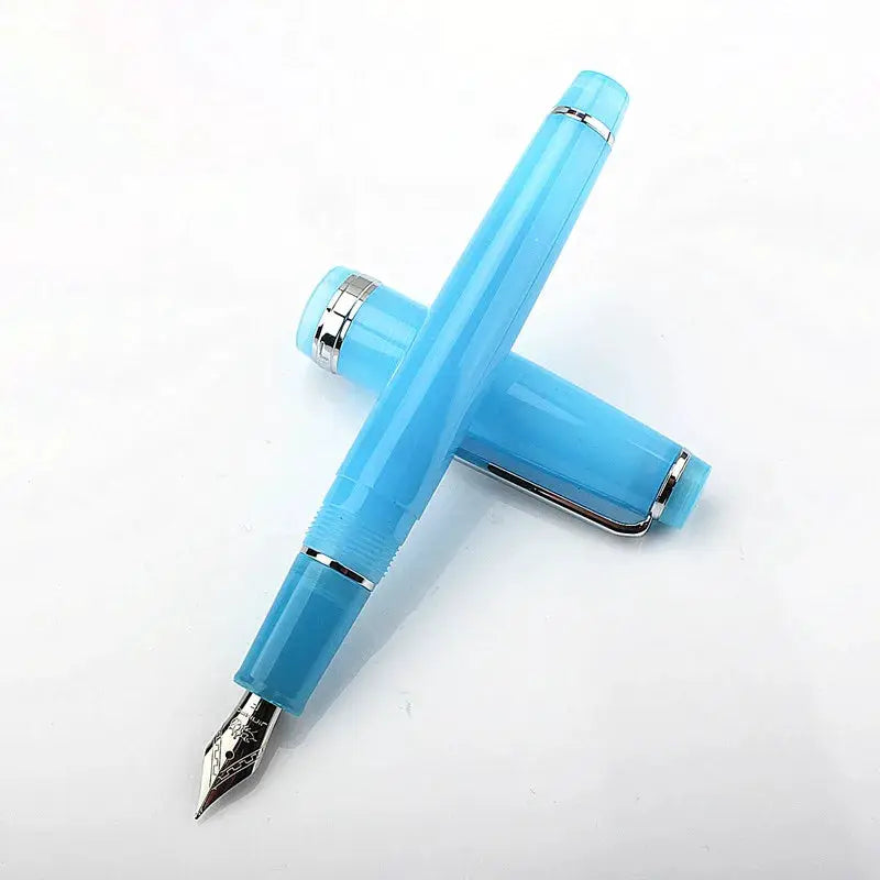 Jinhao 82 fountain pens in blue acrylic with silver trim, two pens shown