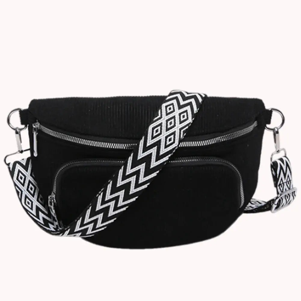 Corduroy chest bag from Simples Market with wide black-and-white zigzag strap and multiple zip pockets.