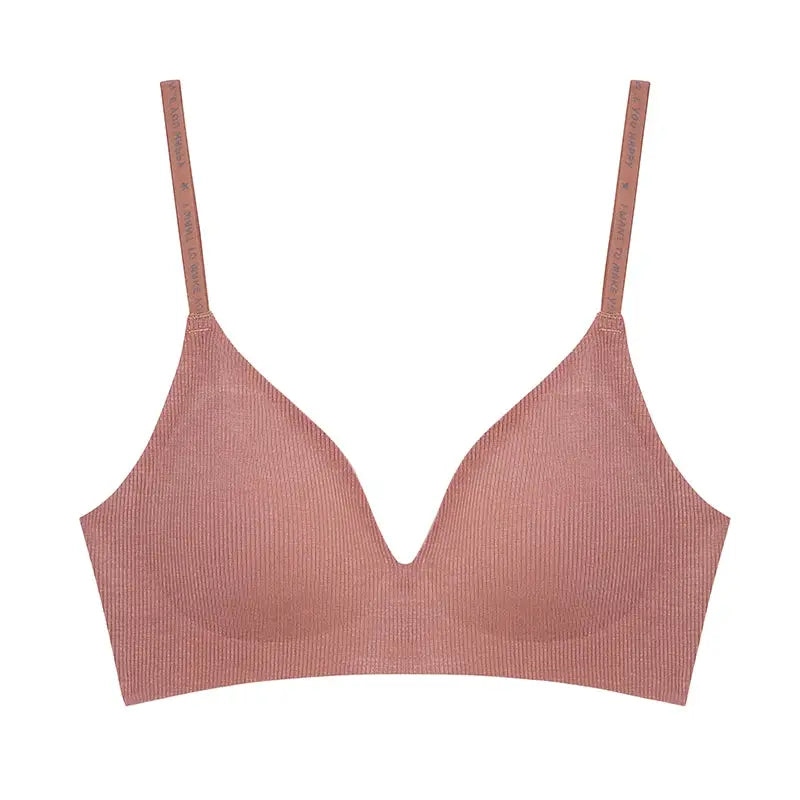 FINETOO wireless deep-V padded bralette in rose pink ribbed knit with adjustable straps.