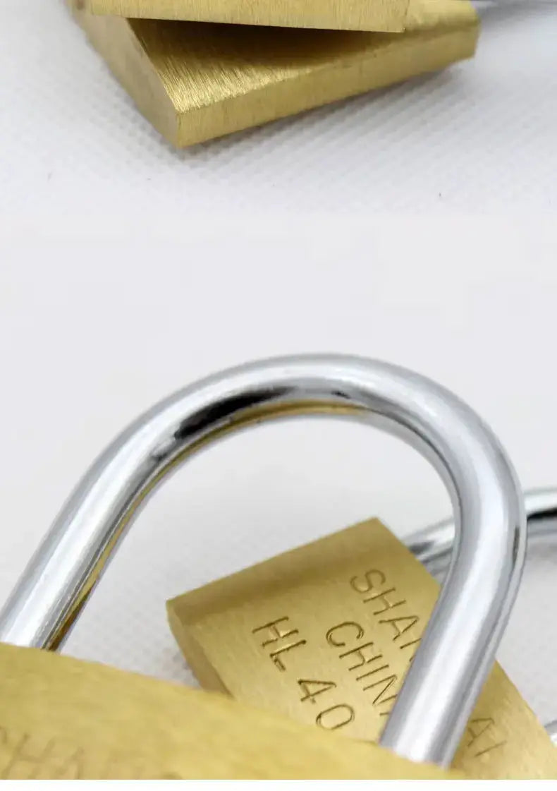 Copper padlock with silver shackle; compact luggage/locker lock includes 3 keys