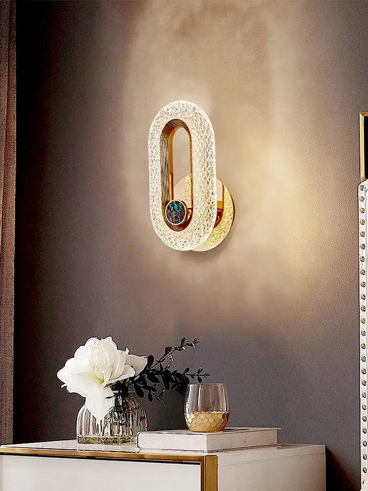 Modern Nordic luxury wall sconce lamp with iron base and white acrylic oval shade, LED, gold accents, Simples Market