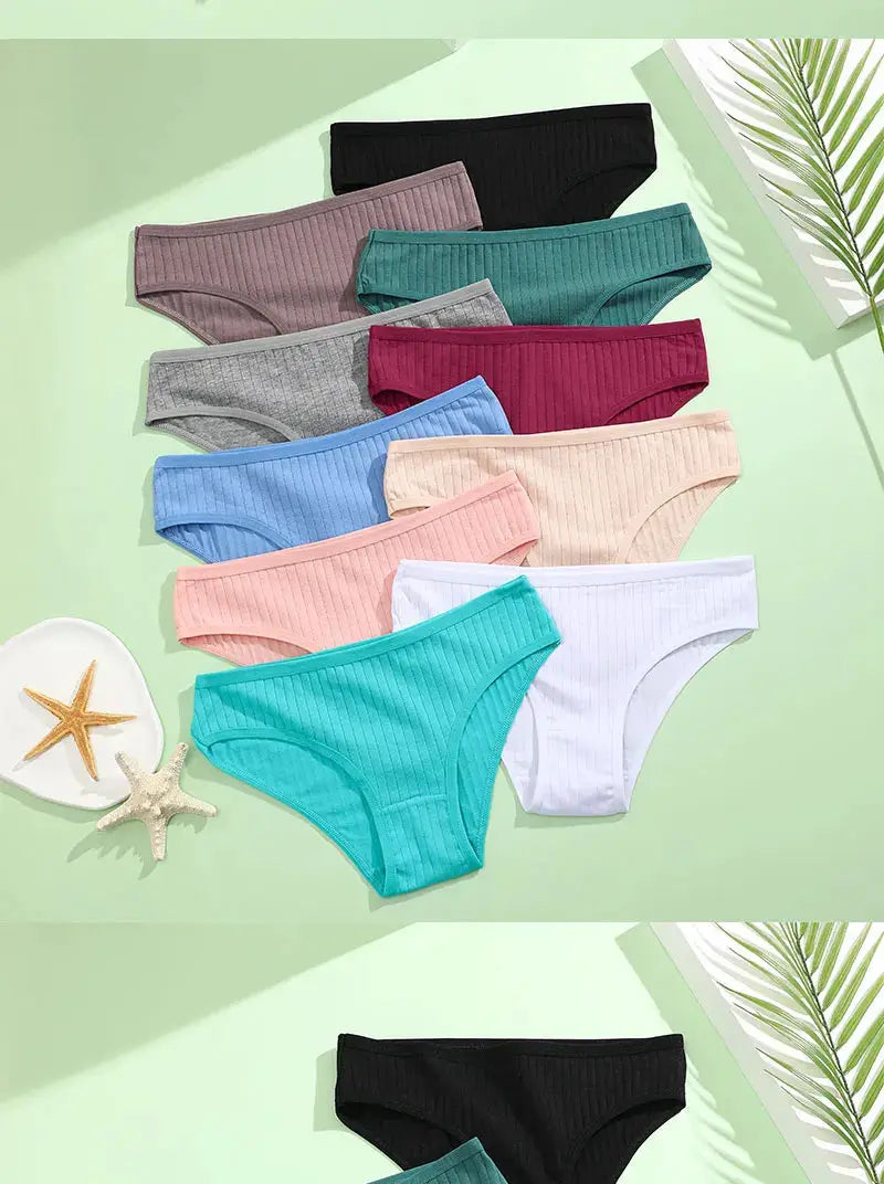 4-pack women's ribbed cotton briefs in assorted solid colors with stretchy waistband (sizes M–XL)