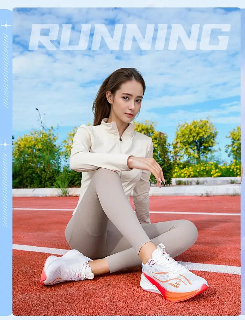 Marathon running shoes, white with orange sole accents, lightweight unisex design with shock absorption
