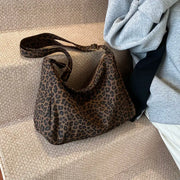 Leopard print shoulder bag with long strap; soft textile, large capacity