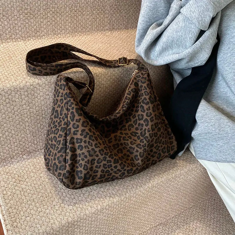 Leopard print shoulder bag with long strap; soft textile, large capacity