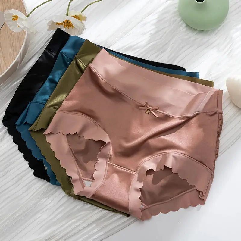 Silk panties 7-pack: satin mid-rise briefs in pink with scalloped edges and a bow, in assorted colors.