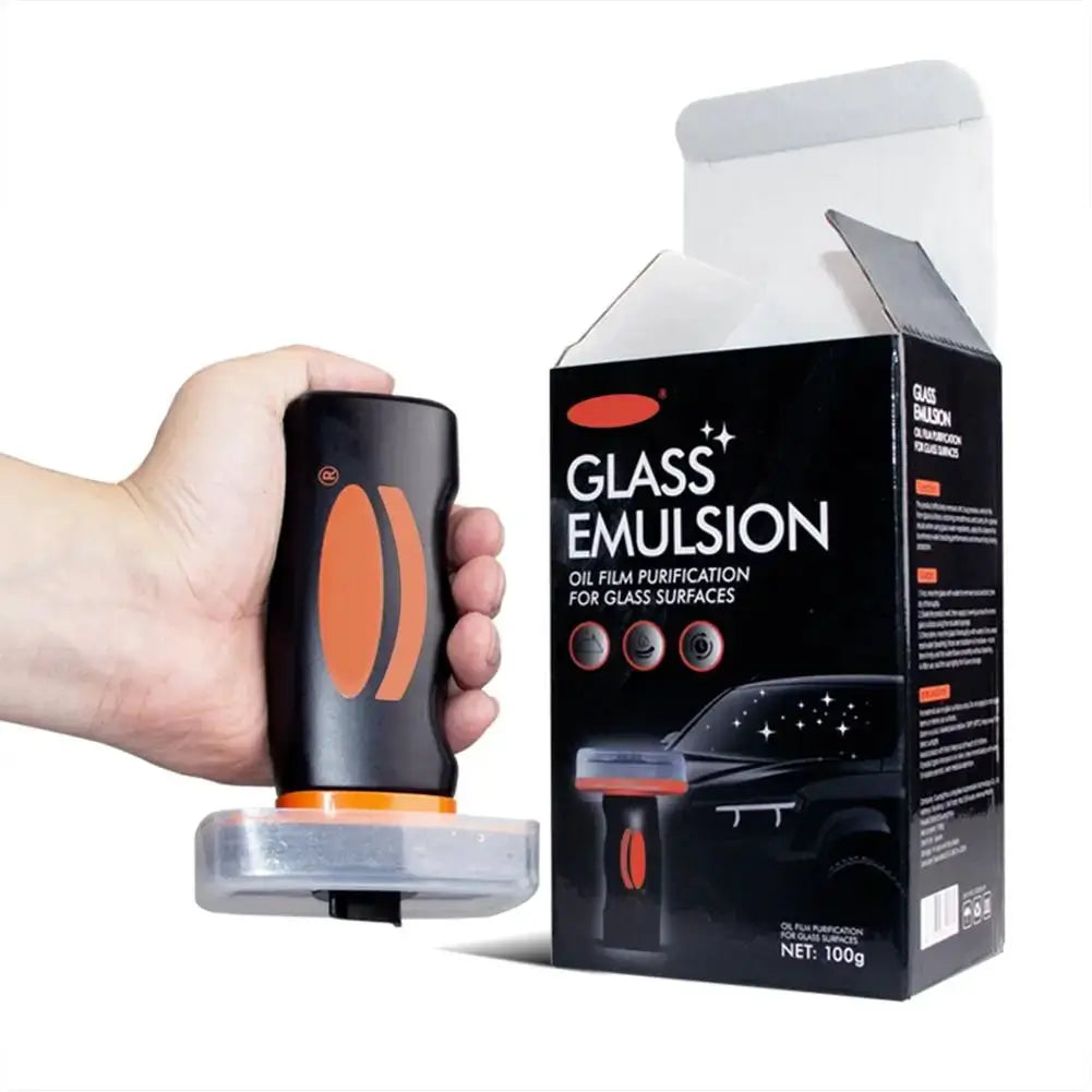 Glass Emulsion car glass cleaner by Simples Market; black handheld applicator with orange detailing and foam pad, 100 g
