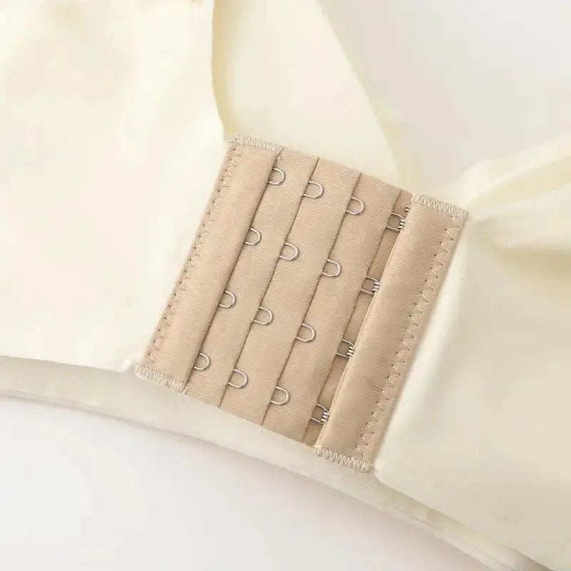 Beige women's push-up bra with back hook closure; seamless, breathable no-wire lingerie by Simples Market