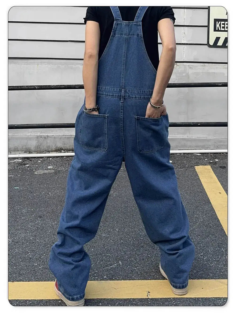 Simples Market men's denim overalls with suspenders, blue washed baggy mid-waist, back view