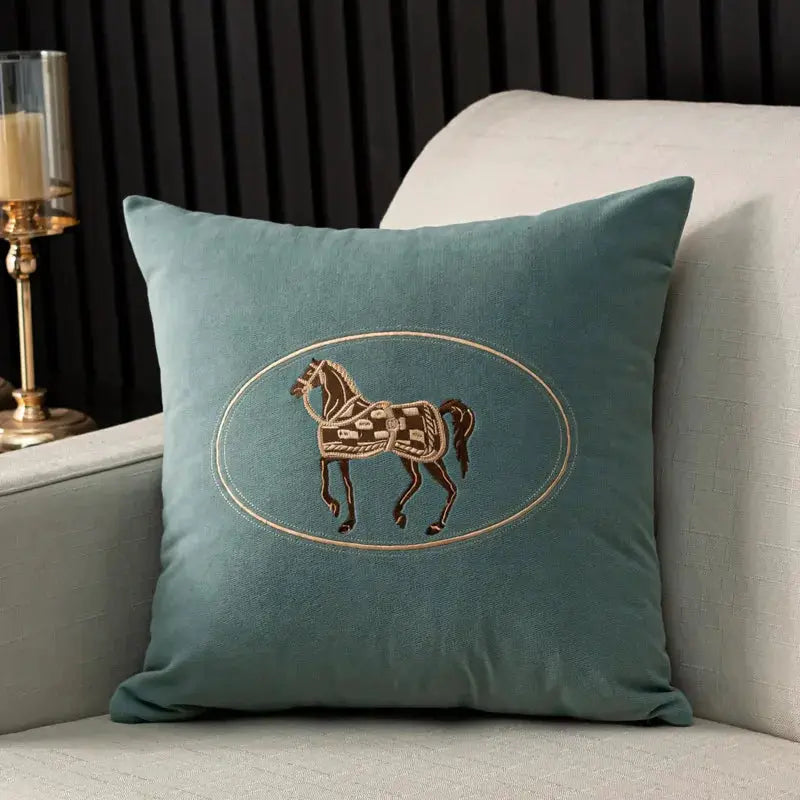 Cushion cover, teal with hand-embroidered horse design inside a gold oval, 45x45cm
